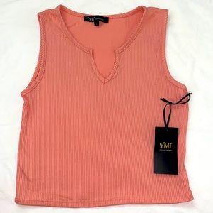 Brand new sleeveless top. Light pink with a small line texture .